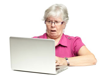 shocked senior computer user